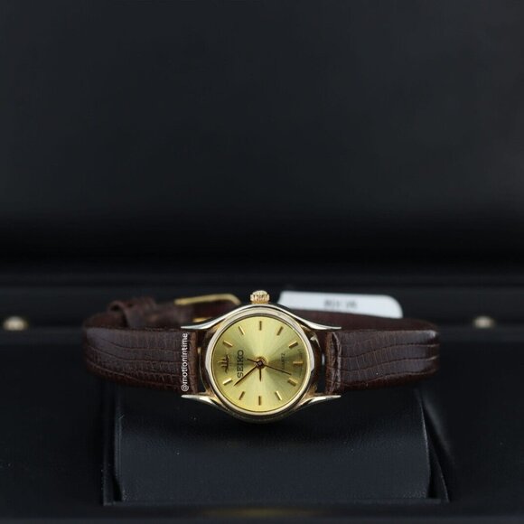 Seiko Gold Tone Champagne Stick Dial Quartz Cocktail 20mm Ladies Watch